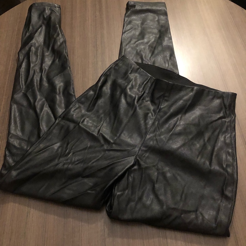 Divided black faux leather pants